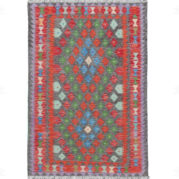 Introducing a remarkable handmade kilim that seamlessly blends the beauty of the natural world with traditional tribal designs. With a vibrant red base color that evokes the warmth of the earth, this kilim tells a story of nature's wonders and tribal heritage.